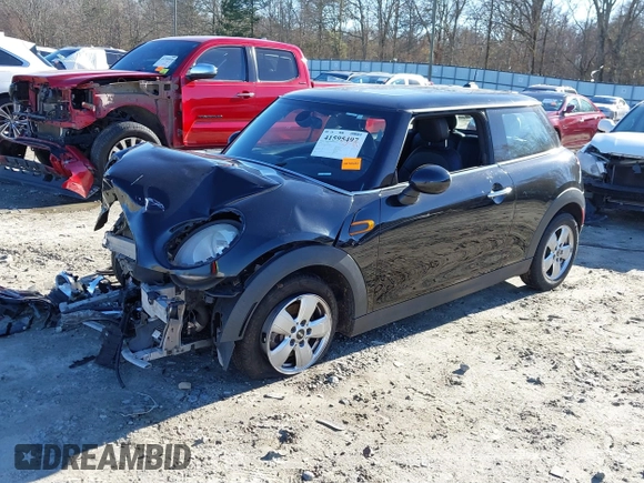 2014 MINI Hardtop with VIN WMWXM5C51ET972099, listed as a IAAI auction lot 41595497 with 113,496 mi miles and . Bid and sale history available at DreamBid. Image 2.