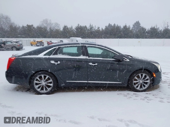 2013 Cadillac XTS with VIN 2G61N5S37D9112979, listed as a IAAI auction lot 41209826 with 83,237 mi miles. Bid and sale history available at carsss.com. Image 13.