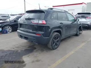 2020 Jeep Cherokee Altitude with VIN 1C4PJMLX9LD634920, listed as a IAAI auction lot 41892720 with 75,388 mi miles and . Bid and sale history available at DreamBid. Image 4.