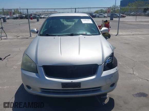 2006 Nissan Altima S with VIN 1N4AL11D56N405498, listed as a IAAI auction lot 42082567 with 228,463 mi miles and . Bid and sale history available at DreamBid. Image 12.