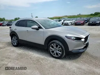 2023 Mazda CX-30 S Select z VIN 3MVDMBBM2PM530400, wystawiony jako Copart lot #58614645 z przebiegiem 26 332 mil mil oraz Szkoda całkowita • Salvage title. Historia ofert i sprzedaży dostępna na DreamBid. Obrazek 14.
