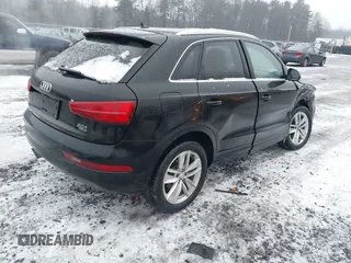 2017 Audi Q3 Premium Plus z VIN WA1JCCFS5HR000986, wystawiony jako IAAI lot #41471543 z przebiegiem 68 087 mil mil oraz . Historia ofert i sprzedaży dostępna na DreamBid. Obrazek 4.