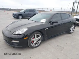 2013 Porsche Panamera with VIN WP0AA2A70DL011450, listed as a IAAI auction lot 41603123 with 97,212 mi miles and . Bid and sale history available at DreamBid. Image 2.