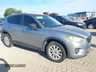 2014 Mazda CX-5 Touring with VIN JM3KE2CY8E0386026, listed as a IAAI auction lot 42698507 with 211,003 mi miles and . Bid and sale history available at DreamBid. Image 1.