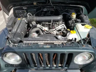 2002 Jeep Wrangler Sahara with VIN 1J4FA59S12P766719, listed as a Copart auction lot 74331964 with 128,881 mi miles and Non Repairable. Bid and sale history available at carsss.com. Image 12.