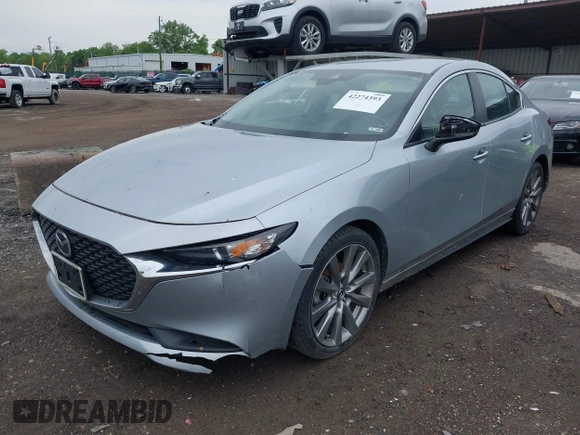 2020 Mazda 3 Select with VIN 3MZBPACL0LM131878, listed as a IAAI auction lot 42274393 with 105,656 mi miles and . Bid and sale history available at DreamBid. Image 2.
