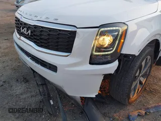 2022 Kia Telluride S with VIN 5XYP64HC1NG310548, listed as a IAAI auction lot 40086564 with 34,397 mi miles and . Bid and sale history available at DreamBid. Image 6.
