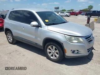 2010 Volkswagen Tiguan S with VIN WVGAV7AX5AW002380, listed as a IAAI auction lot 42604662 with 124,841 mi miles and . Bid and sale history available at DreamBid. Image 1.