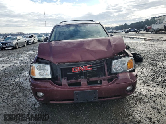 2003 GMC Envoy SLT with VIN 1GKDT13S032245485, listed as a Copart auction lot 84385304 with 139,183 mi miles and Salvage Title. Bid and sale history available at carsss.com. Image 5.