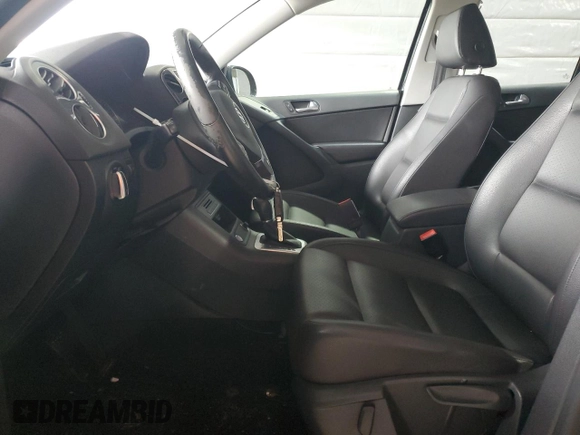 2017 Volkswagen Tiguan S with VIN WVGBV7AXXHK011064, listed as a Copart auction lot 49745425 with 67,994 mi miles and Salvage Title. Bid and sale history available at DreamBid. Image 7.