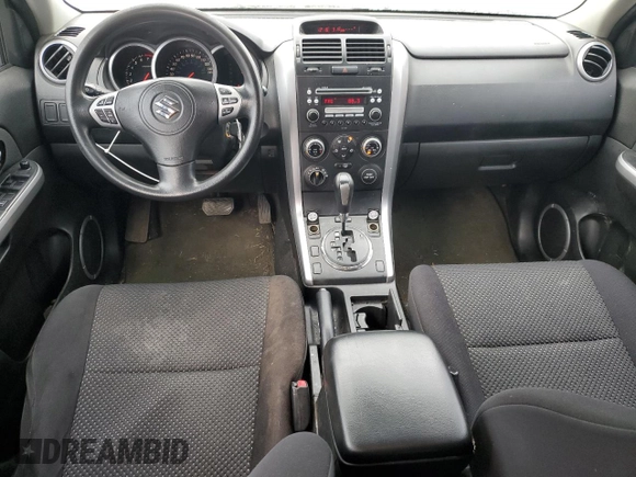 2007 Suzuki Grand Vitara with VIN JS3TD941474204507, listed as a Copart auction lot 84394604 with 308,294 mi miles and Salvage title. Bid and sale history available at DreamBid. Image 8.