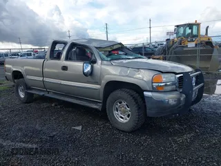 2000 GMC Sierra 2500 SLE z VIN 1GTGK29U7YE380284, wystawiony jako IAAI lot #41965443 z przebiegiem 189 831 mil mil oraz . Historia ofert i sprzedaży dostępna na DreamBid. Obrazek 1.