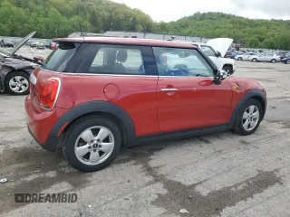2014 MINI Hardtop with VIN WMWXM5C52ET934803, listed as a Copart auction lot 55284765 with 96,519 mi miles and Salvage title. Bid and sale history available at DreamBid. Image 3.