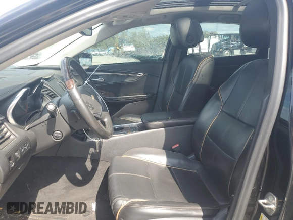 2014 Chevrolet Impala LTZ with VIN 1G1155S38EU169167, listed as a Copart auction lot 73174254 with 156,884 mi miles and Salvage Title. Bid and sale history available at DreamBid. Image 7.