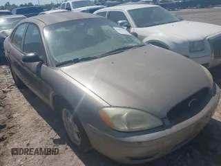 2005 Ford Taurus SE with VIN 1FAFP53UX5A269986, listed as a IAAI auction lot 41821102 with 145,498 mi miles. Bid and sale history available at carsss.com. Image 1.