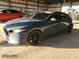2019 Mazda Mazda3 Hatchback w/Premium Pkg with VIN JM1BPBNM7K1142435, listed as a Copart auction lot 84893404 with 102,722 mi miles and Salvage Title. Bid and sale history available at carsss.com. Image 1.