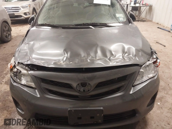 2012 Toyota Corolla L with VIN 5YFBU4EE9CP047479, listed as a IAAI auction lot 41727512 with 128,970 mi miles. Bid and sale history available at carsss.com. Image 6.