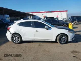 2014 Mazda 3 i Grand Touring with VIN JM1BM1M7XE1102093, listed as a IAAI auction lot 41344433 with 148,395 mi miles and . Bid and sale history available at DreamBid. Image 13.