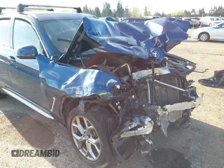 2020 BMW X3 xDrive30i with VIN 5UXTY5C04LLT35519, listed as a IAAI auction lot 42018934 with Not Provided miles and . Bid and sale history available at DreamBid. Image 6.