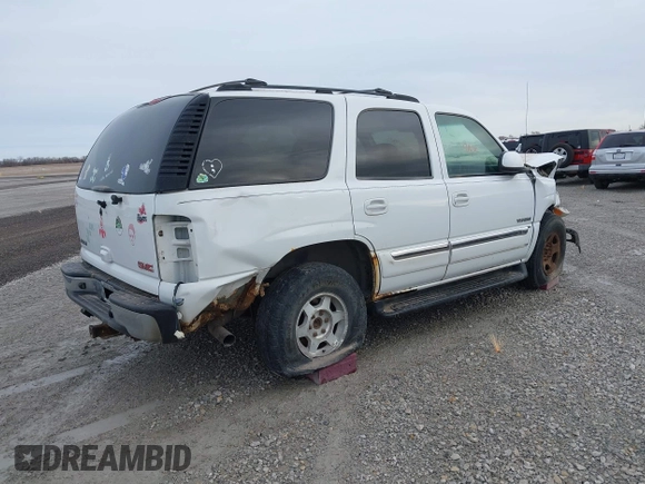 2003 GMC Yukon SLT with VIN 1GKEK13V23J300767, listed as a IAAI auction lot 41691632 with 251,849 mi miles. Bid and sale history available at carsss.com. Image 4.