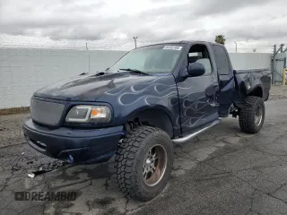 2002 Ford F-150 with VIN 1FTPX17L02NA71656, listed as a Copart auction lot 49182185 with 49,745 mi miles and Salvage title. Bid and sale history available at DreamBid. Image 1.
