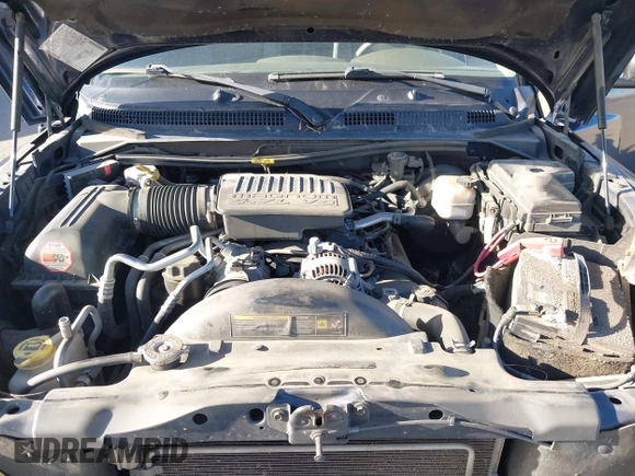 2005 Dodge Dakota SLT with VIN 1D7HW42N15S365967, listed as a IAAI auction lot 41798935 with 220,243 mi miles and . Bid and sale history available at DreamBid. Image 10.