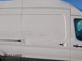 2020 Ford Transit Cargo with VIN 1FTBR1X82LKB80557, listed as a IAAI auction lot 41217513 with 89,774 mi miles and . Bid and sale history available at DreamBid. Image 14.