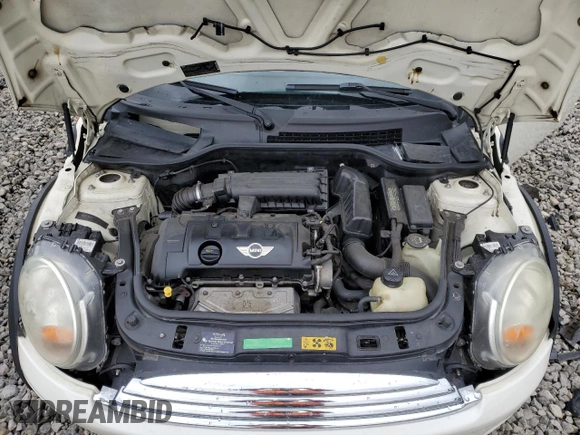 2007 MINI Hardtop with VIN WMWMF33567TT56922, listed as a Copart auction lot 56598665 with 66,605 mi miles and Salvage title. Bid and sale history available at DreamBid. Image 11.
