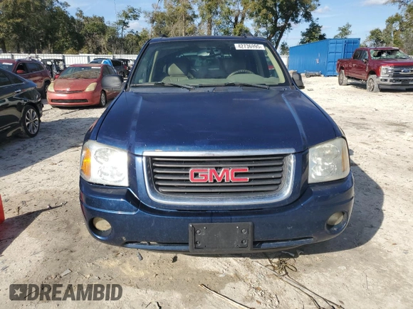 2004 GMC Envoy SLT with VIN 1GKDS13S042311327, listed as a Copart auction lot 42736995 with 235,164 mi miles and Salvage Title. Bid and sale history available at carsss.com. Image 5.