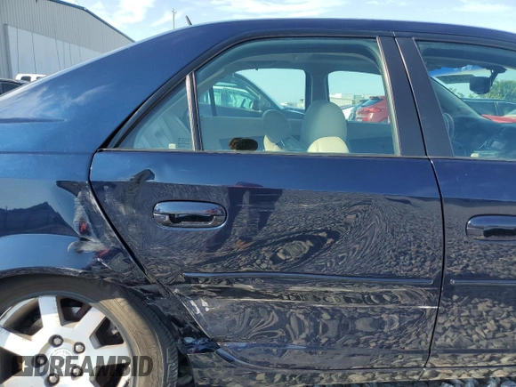 2005 Cadillac CTS z VIN 1G6DP567150114713, wystawiony jako Copart lot #58413445 z przebiegiem 71 927 mil mil oraz Szkoda całkowita • Salvage title. Historia ofert i sprzedaży dostępna na DreamBid. Obrazek 10.