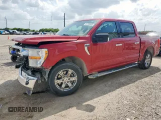 2021 Ford F-150 XL with VIN 1FTEW1C52MFA73276, listed as a Copart auction lot 61730665 with 163,262 mi miles and Salvage title. Bid and sale history available at DreamBid. Image 1.