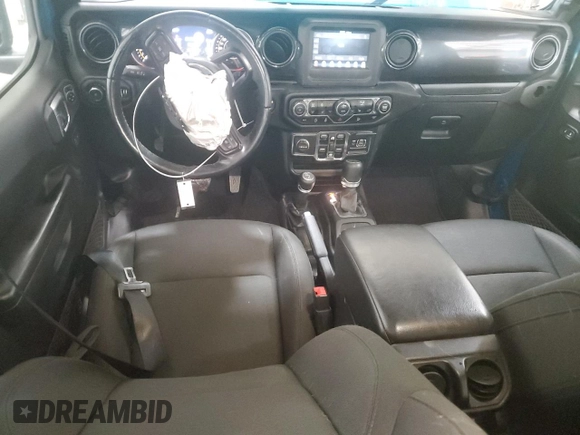 2020 Jeep Wrangler Unlimited Sport Altitude with VIN 1C4HJXDNXLW335332, listed as a Copart auction lot 62008745 with 57,449 mi miles and Salvage title. Bid and sale history available at DreamBid. Image 8.