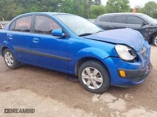 2009 Kia Rio SX with VIN KNADE223996508478, listed as a IAAI auction lot 41912755 with 157,556 mi miles. Bid and sale history available at carsss.com. Image 1.