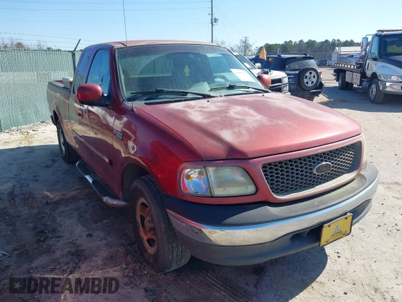 2000 Ford F-150 XL with VIN 1FTZX1725YNA94343, listed as a IAAI auction lot 41659358 with 295,337 mi miles. Bid and sale history available at carsss.com. Image 14.