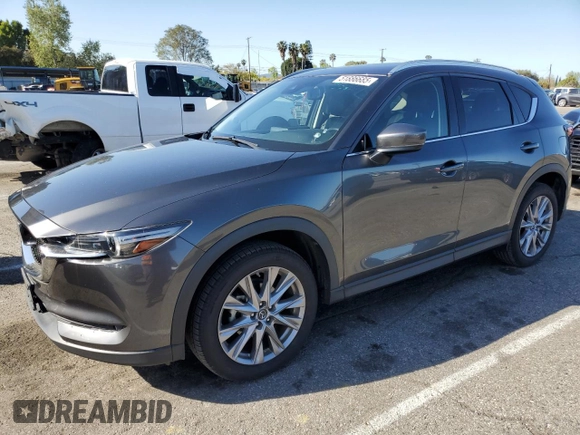2019 Mazda CX-5 Grand Touring with VIN JM3KFADM2K0665356, listed as a Copart auction lot 51886685 with 44,760 mi miles and Salvage Title. Bid and sale history available at carsss.com. Image 1.