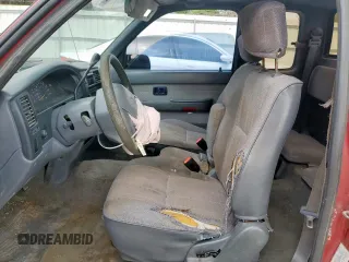 1997 Toyota Tacoma z VIN 4TAVN52N2VZ327902, wystawiony jako Copart lot #57450935 z przebiegiem 300 278 mil mil oraz Szkoda całkowita • Salvage title. Historia ofert i sprzedaży dostępna na DreamBid. Obrazek 7.