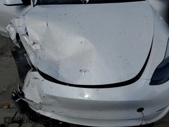 2022 Tesla Model Y Performance с VIN 7SAYGDEF2NF405596, выставлен на аукционе Copart как лот 52868195 с пробегом Не указан миль и Списание • Salvage title. История ставок и продаж доступна на DreamBid. Изображение 14.