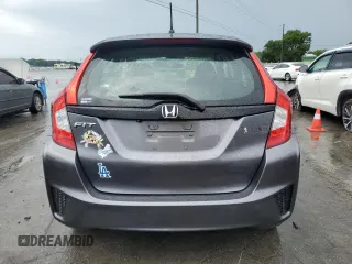2015 Honda Fit LX с VIN 3HGGK5G59FM731945, выставлен на аукционе Copart как лот 61272285 с пробегом 126 060 миль миль и Списание • Salvage title. История ставок и продаж доступна на DreamBid. Изображение 6.