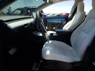 2021 Tesla Model Y Performance z VIN 5YJYGDEF0MF157795, wystawiony jako Copart lot #57163245 z przebiegiem 62 598 mil mil oraz Szkoda całkowita • Salvage title. Historia ofert i sprzedaży dostępna na DreamBid. Obrazek 7.