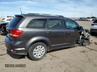 2019 Dodge Journey SE with VIN 3C4PDCBG7KT874236, listed as a Copart auction lot 53352685 with 131,142 mi miles and Clean Title. Bid and sale history available at DreamBid. Image 3.