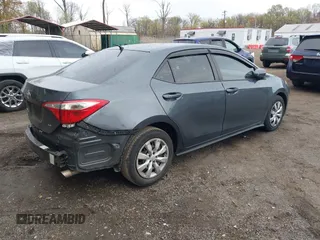 2015 Toyota Corolla L with VIN 2T1BURHE2FC349953, listed as a IAAI auction lot 42001672 with 104,776 mi miles and . Bid and sale history available at DreamBid. Image 4.
