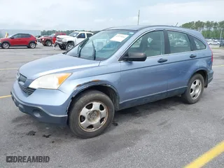 2007 Honda CR-V LX with VIN JHLRE48317C057561, listed as a IAAI auction lot 42119266 with 307,373 mi miles. Bid and sale history available at carsss.com. Image 2.