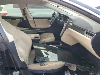 2016 Tesla Model S 90D с VIN 5YJSA1E27GF125739, выставлен на аукционе Copart как лот 75074624 с пробегом Не указан миль и Списание • Salvage title. История ставок и продаж доступна на DreamBid. Изображение 7.