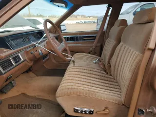 1989 Oldsmobile Delta z VIN 1G3HN54C2KW373577, wystawiony jako Copart lot #41532245 z przebiegiem 78 364 mil mil oraz Tytuł czysty. Historia ofert i sprzedaży dostępna na DreamBid. Obrazek 7.