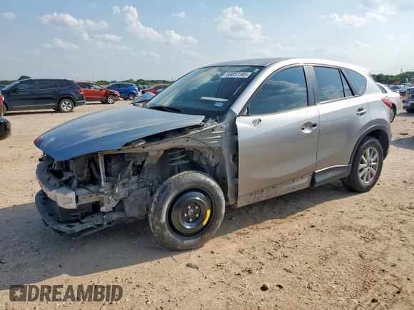 2013 Mazda CX-5 Sport with VIN JM3KE2BE5D0129797, listed as a Copart auction lot 58051185 with 200,712 mi miles and Salvage title. Bid and sale history available at DreamBid. Image 1.