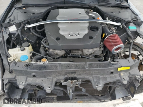 2004 Infiniti G35 w/Leather z VIN JNKCV54E24M800099, wystawiony jako Copart lot #59797675 z przebiegiem 156 273 mil mil oraz Szkoda całkowita • Salvage title. Historia ofert i sprzedaży dostępna na DreamBid. Obrazek 11.