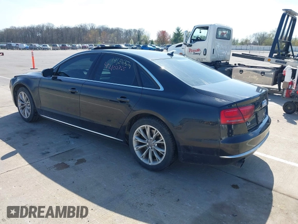 2011 Audi A8 with VIN WAUAVAFD5BN022388, listed as a IAAI auction lot 42102765 with 141,865 mi miles and . Bid and sale history available at DreamBid. Image 3.