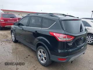 2013 Ford Escape SE with VIN 1FMCU0GX5DUB68604, listed as a IAAI auction lot 42126594 with 165,540 mi miles and . Bid and sale history available at carsss.com. Image 3.