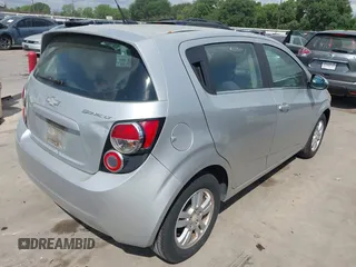 2013 Chevrolet Sonic LT with VIN 1G1JC6SH4D4120148, listed as a IAAI auction lot 42053784 with 166,369 mi miles. Bid and sale history available at carsss.com. Image 4.