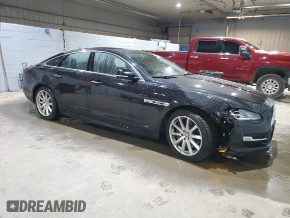 2016 Jaguar XJ R-Sport with VIN SAJWJ1CDXG8V99210, listed as a Copart auction lot 82693224 with 81,978 mi miles and Salvage title. Bid and sale history available at DreamBid. Image 4.
